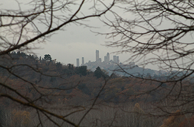 A view of castles in the distance from a winery in Tuscany A view of castles in the distance from a winery in Tuscany